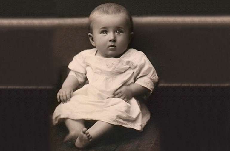 After: Fully Restored Heritage Photo with Pristine Paper & Tones